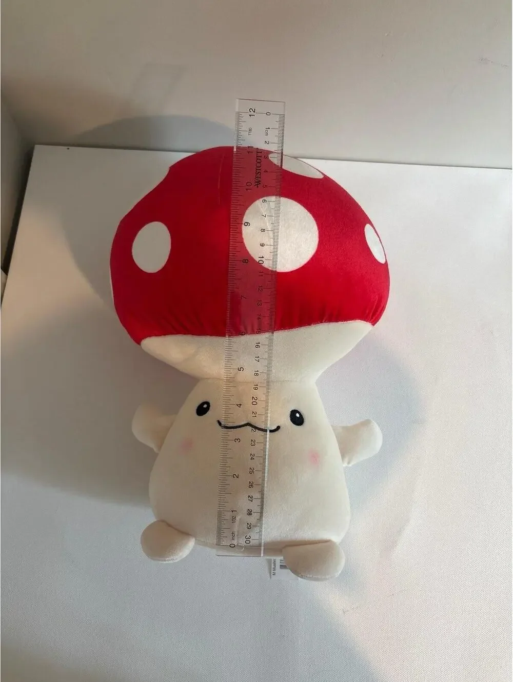Cute soft plush mushroom with red top and white spots